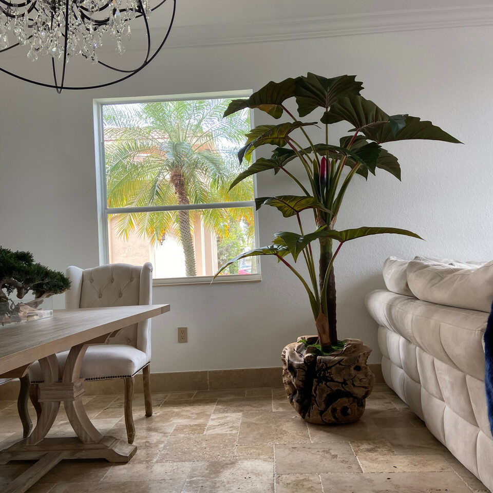 Largealer artificial plant in bowl