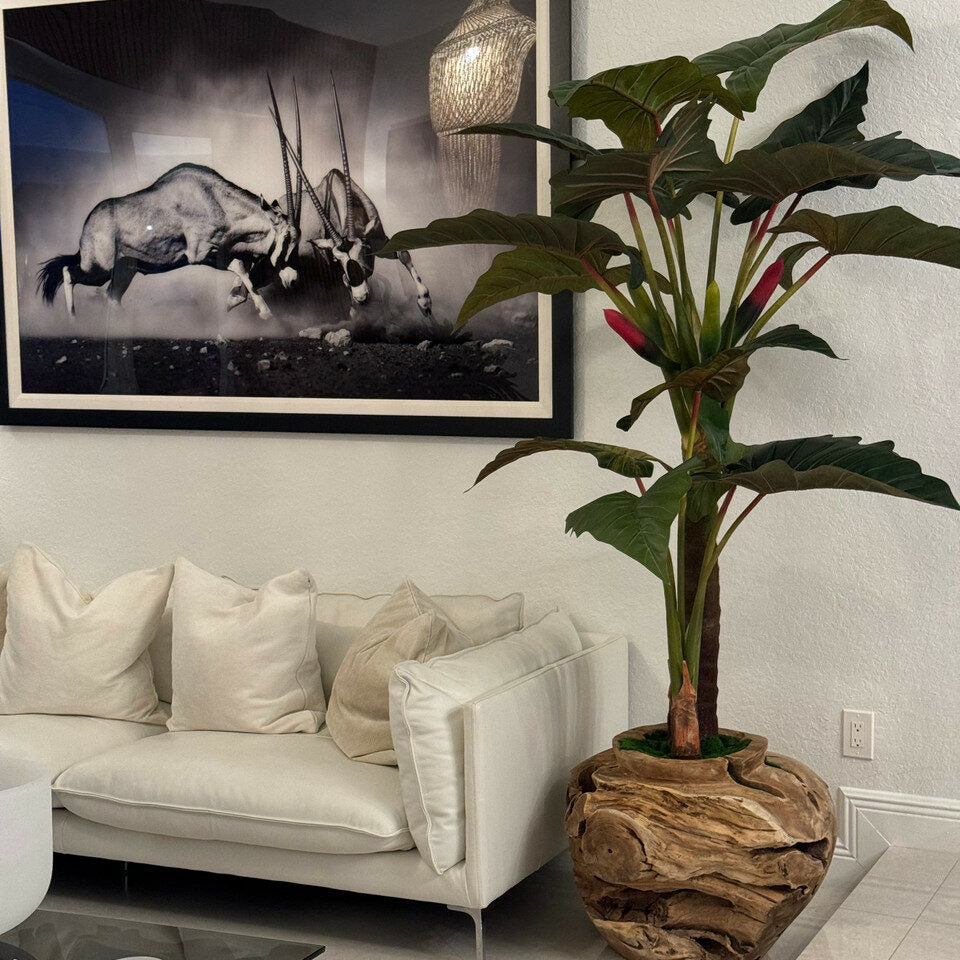 Largealer artificial plant in bowl